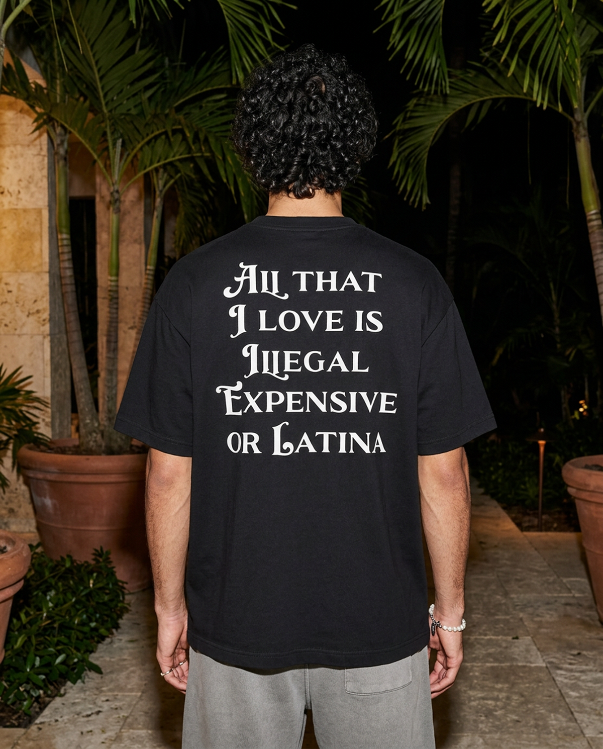 All That I Love Is Latina oversized tee in Black — lifestyle — editorial 1