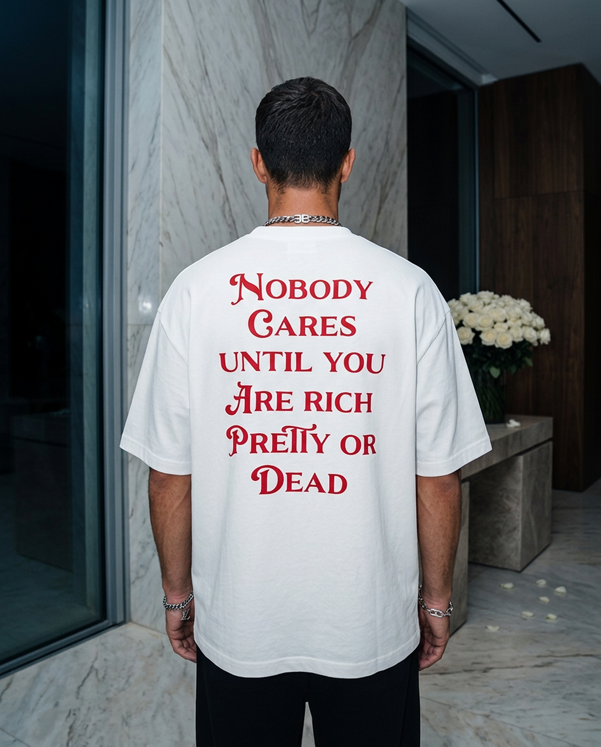 Nobody Cares Until oversized tee in White — editorial