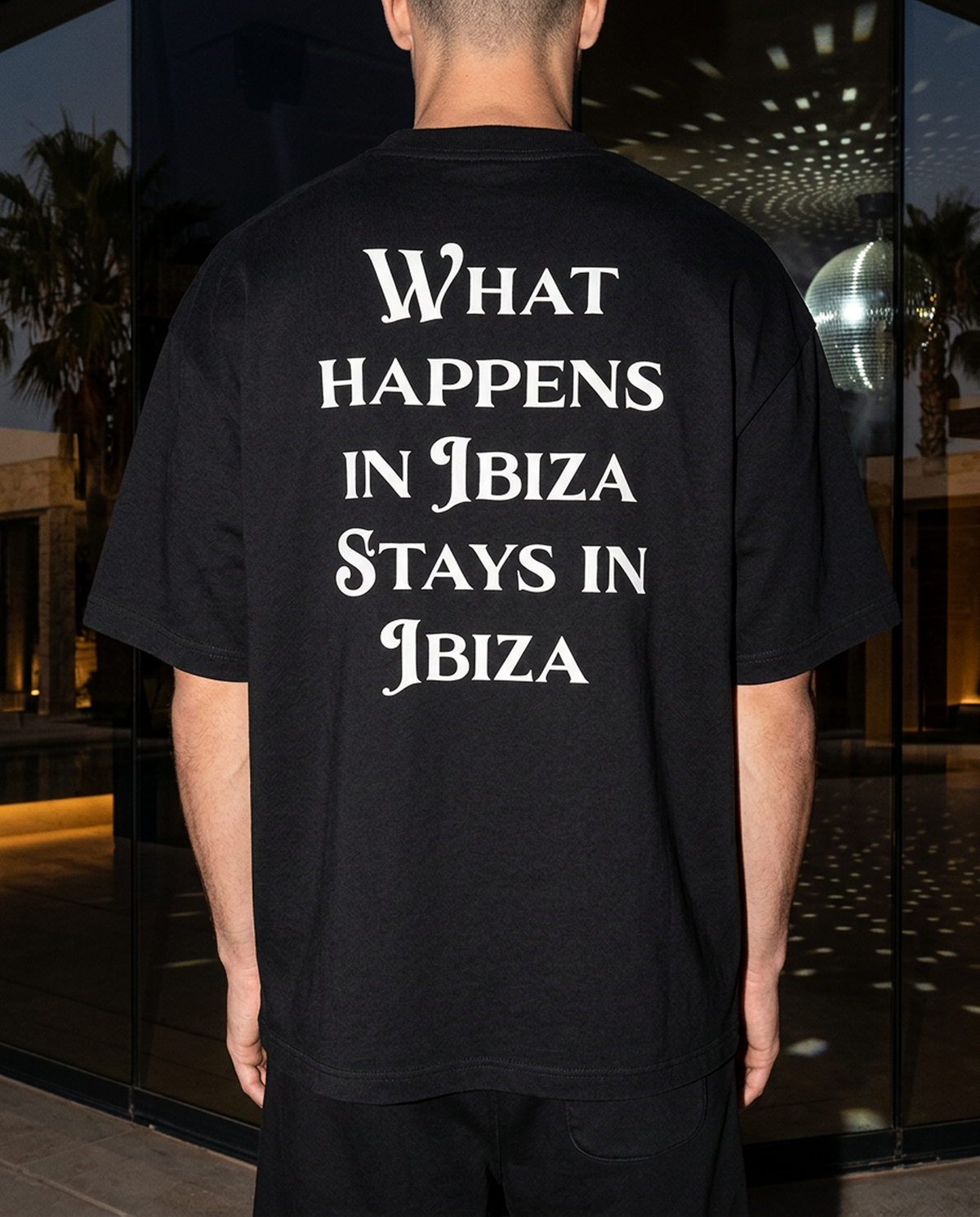 What Happens In Ibiza oversized tee in Black — lifestyle — editorial 1