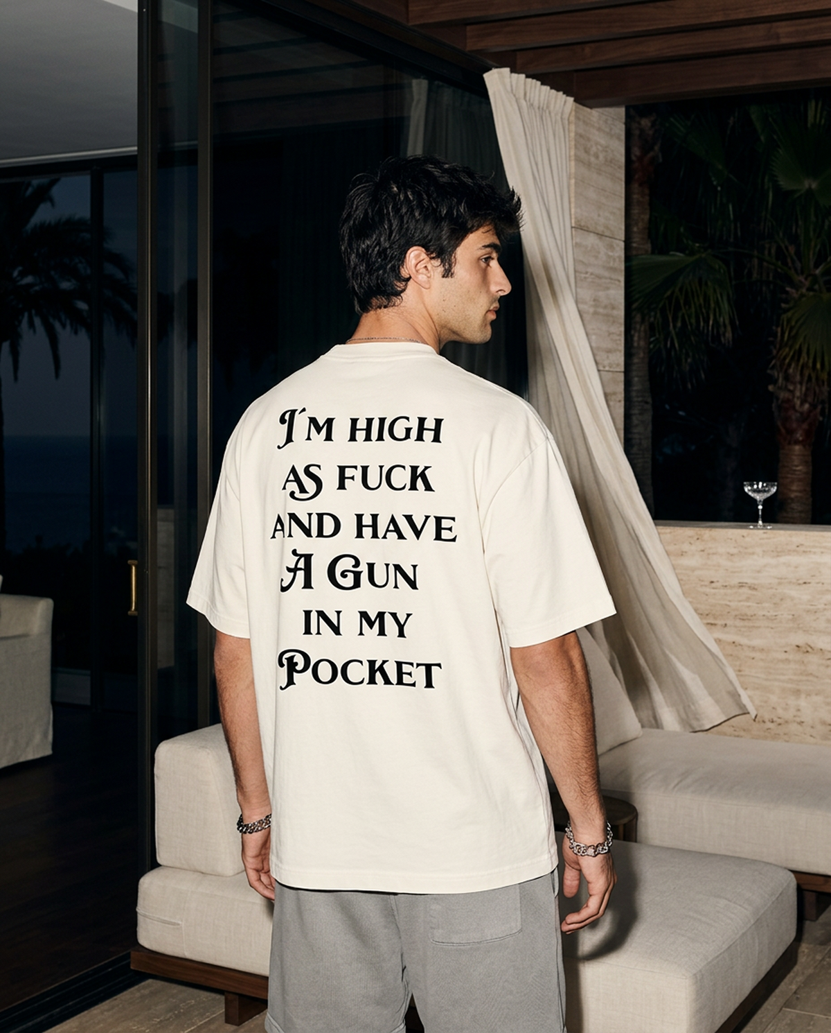 Gun In My Pocket oversized tee in White — editorial — lifestyle 2
