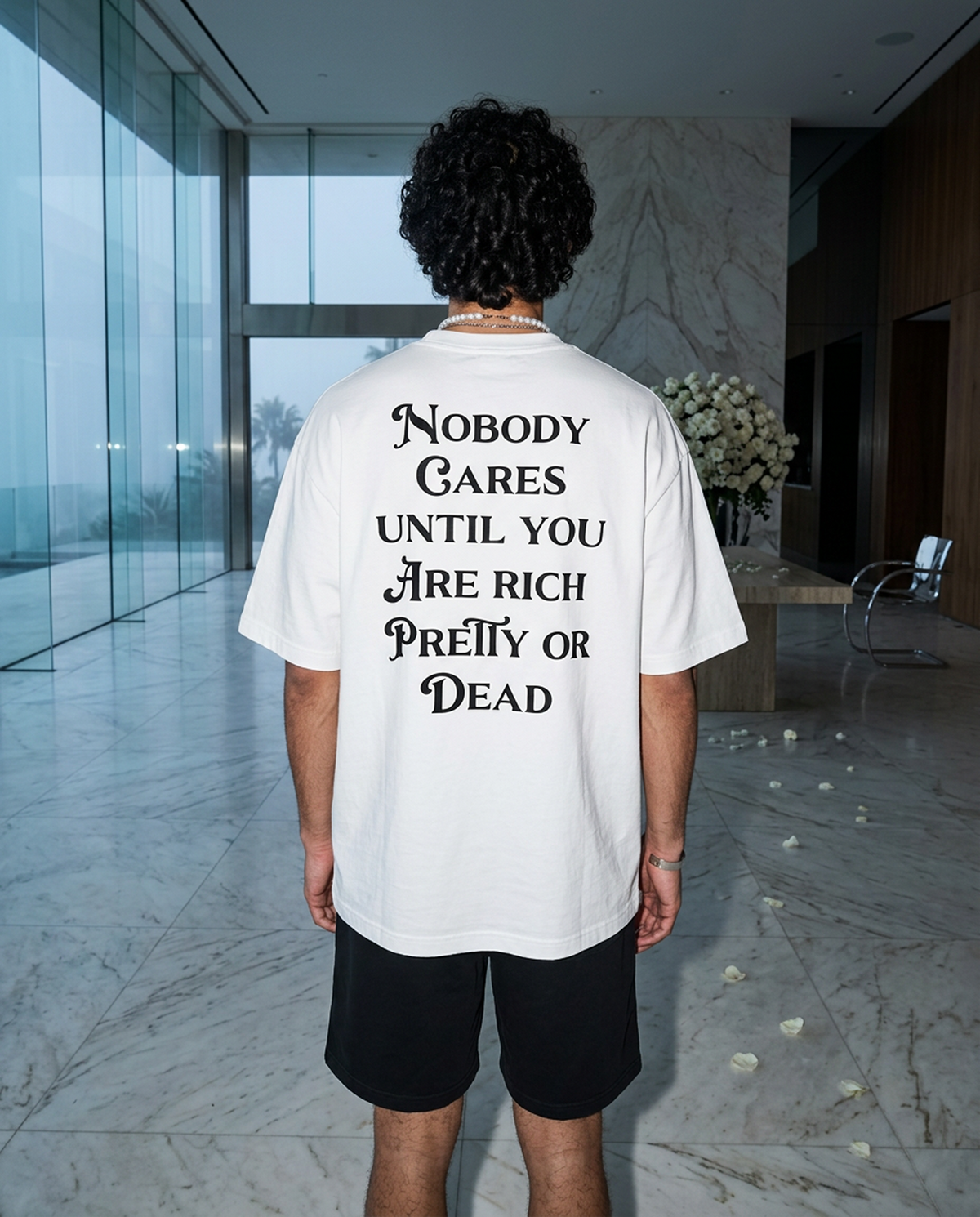 Nobody Cares Until oversized tee in White — editorial — lifestyle 2