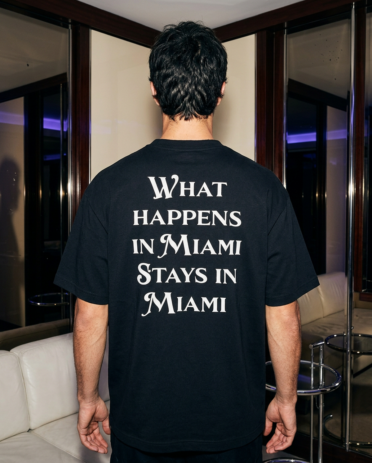 What Happens In Miami oversized tee in Black — lifestyle — editorial 1