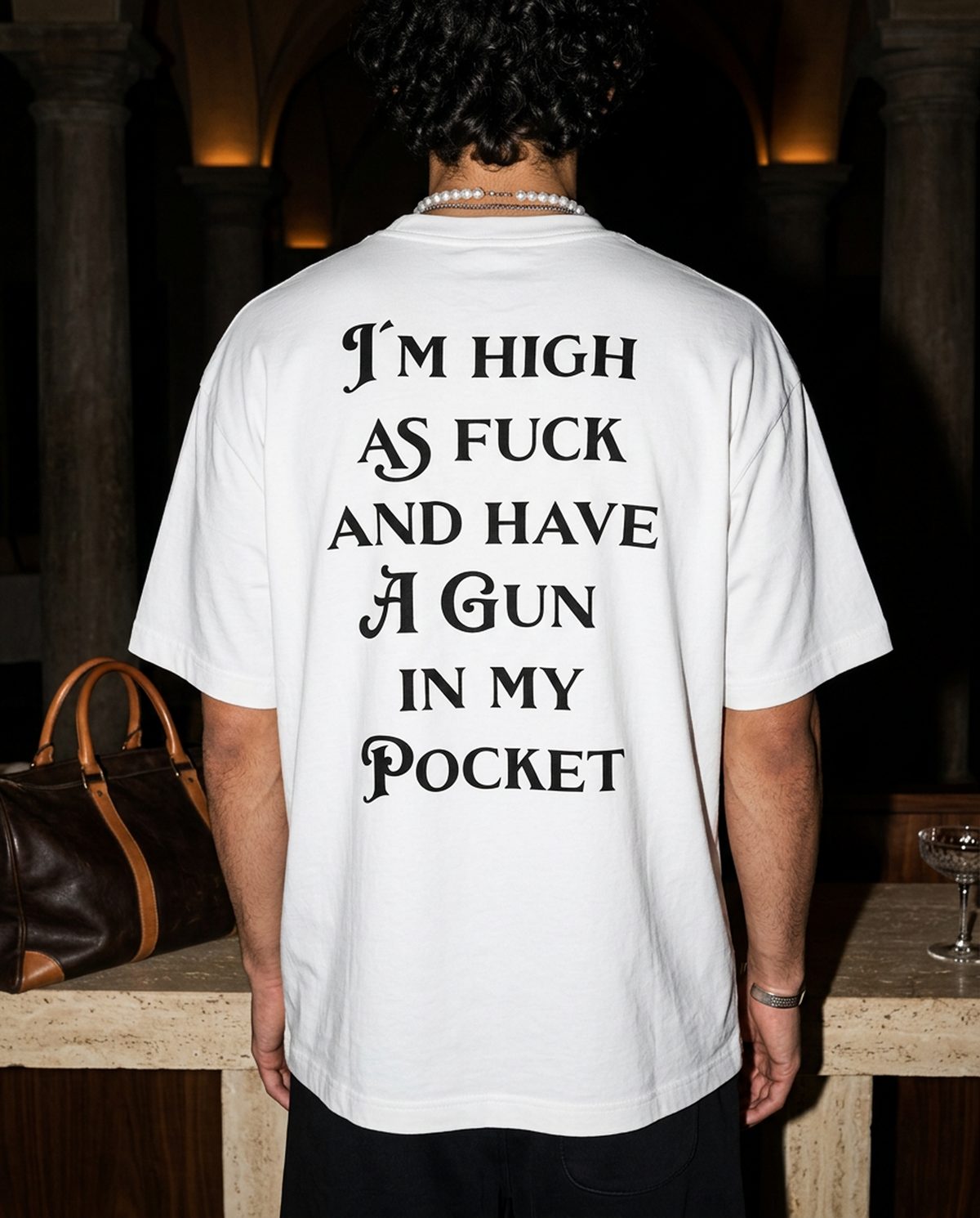 Gun In My Pocket oversized tee in White — lifestyle