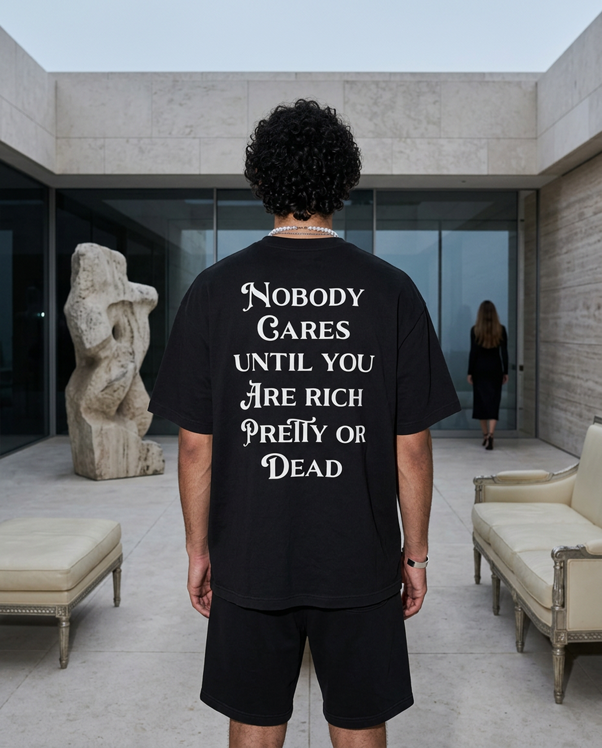 Nobody Cares Until oversized tee in Black — editorial