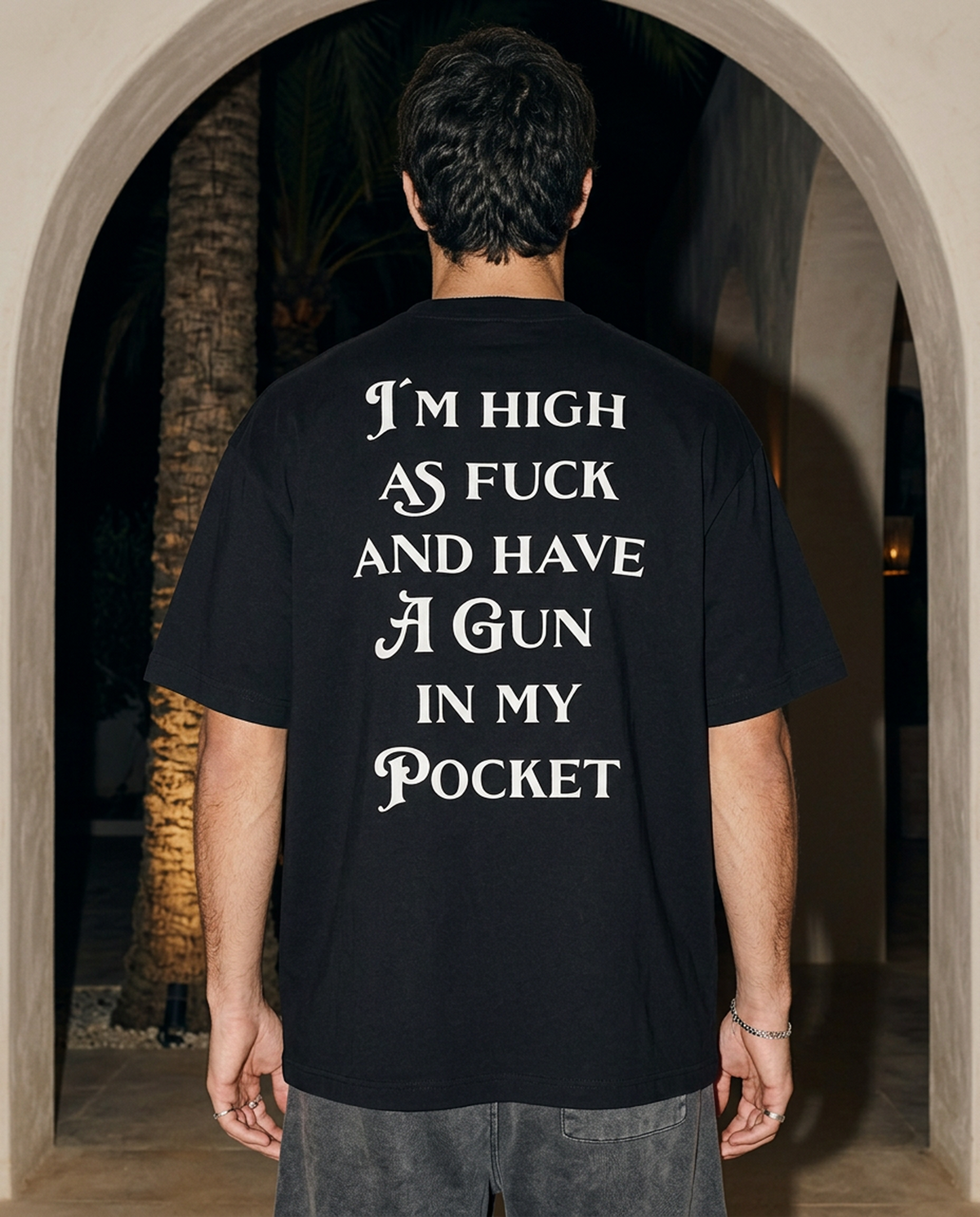 Gun In My Pocket oversized tee in Black — lifestyle