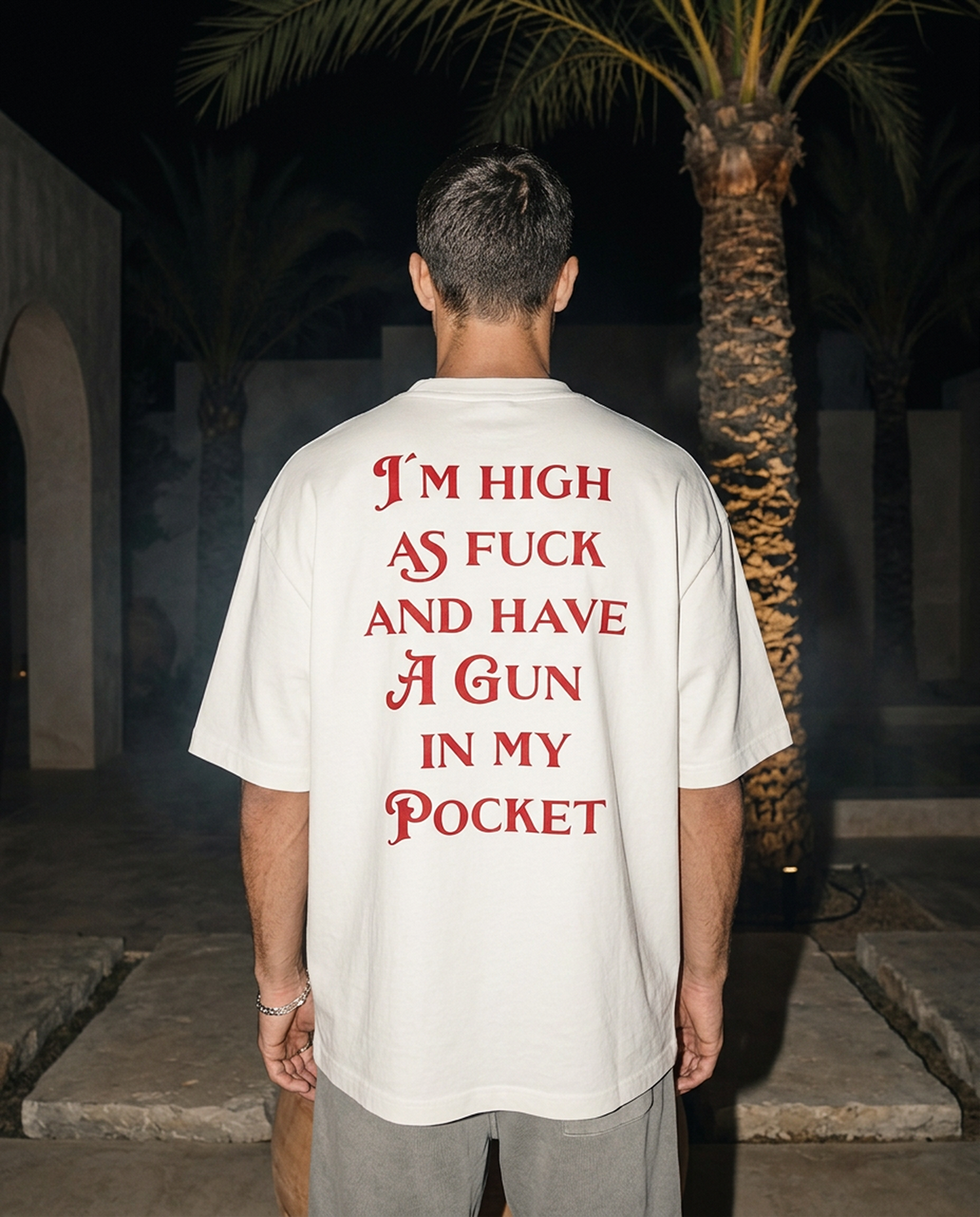 Gun In My Pocket oversized tee in White — lifestyle
